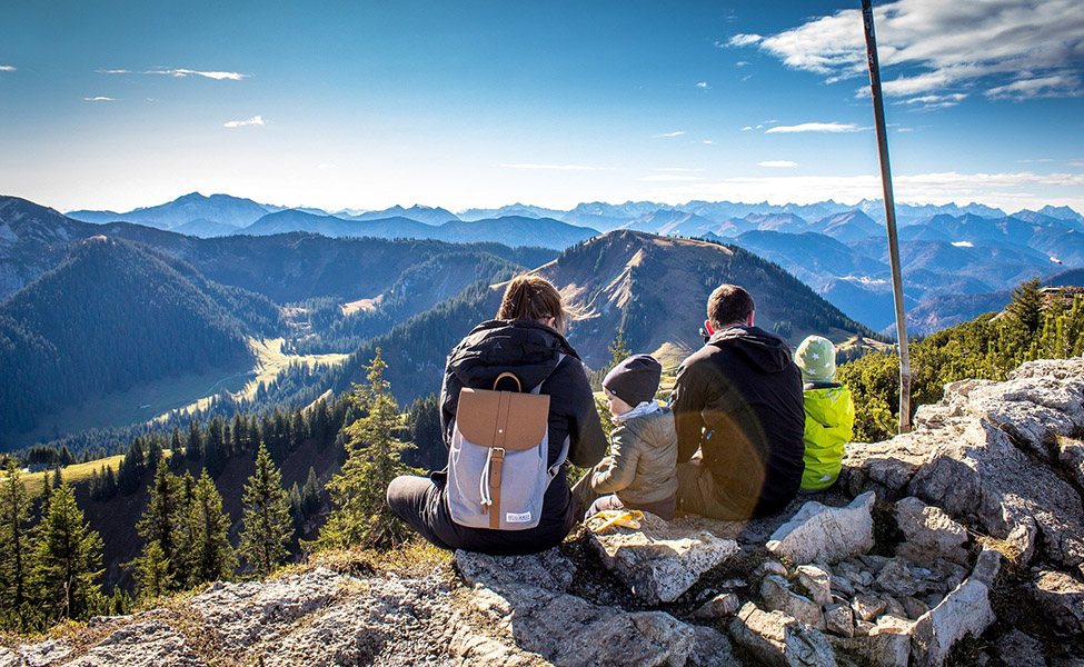 Family hiking on the Alps