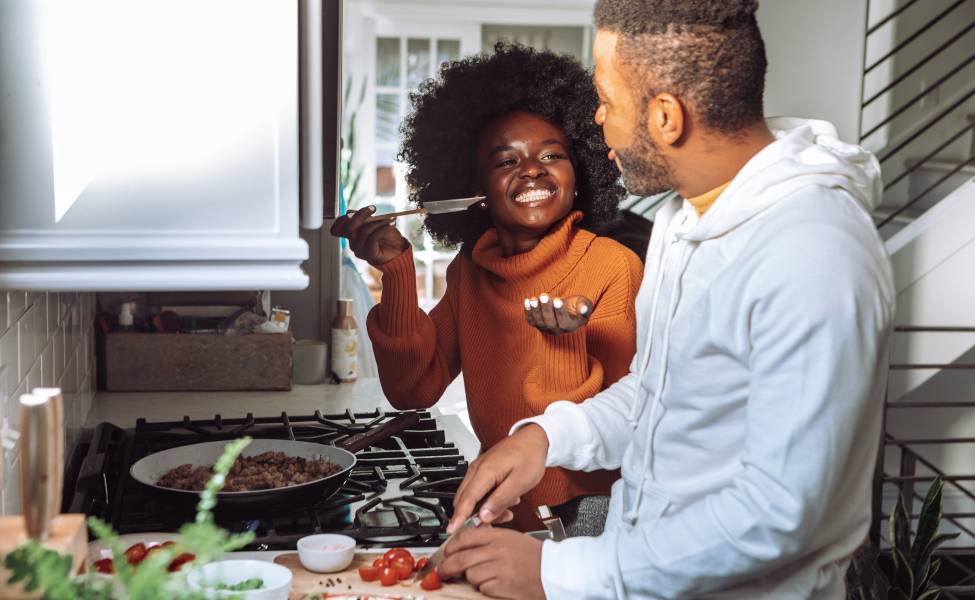 Couple enjoying cooking 