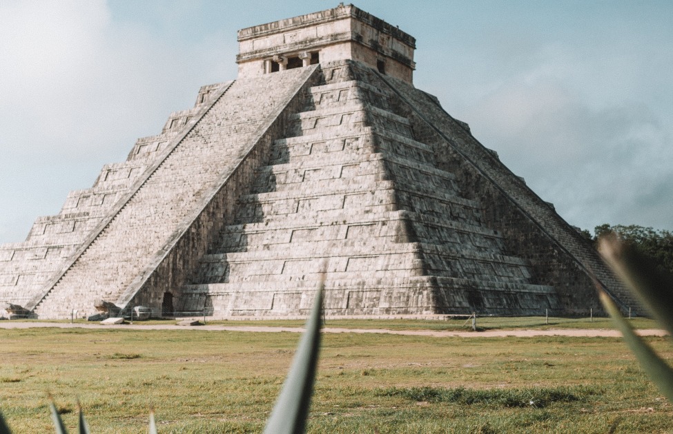 Pyramid of Chichen Itza and a plan in front of it