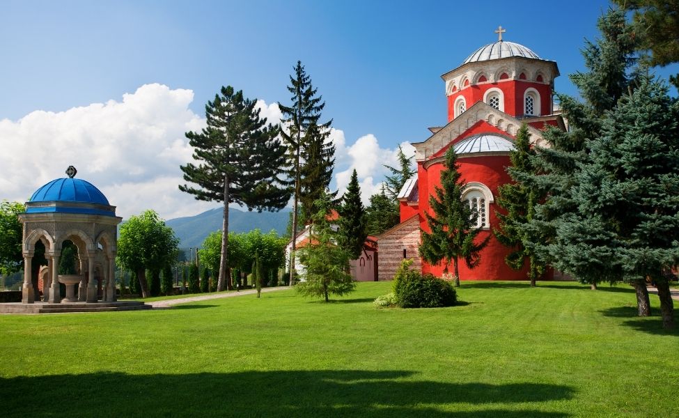 Backyard of a monastery and a smaller building 