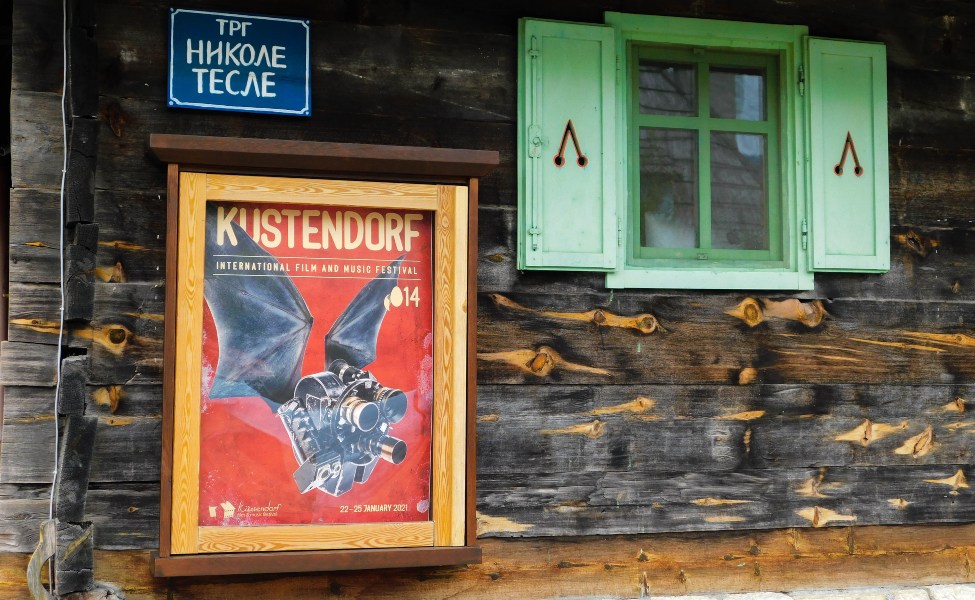 Poster for a film festival on a wooden house