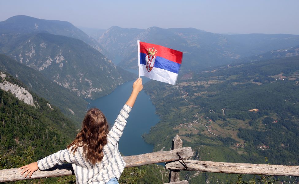 Girl with a Serbian flag at the Banjska stena viewpoint 