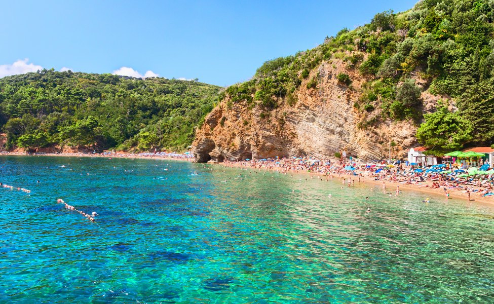 Beach filled with people in Budva, Montenegro 